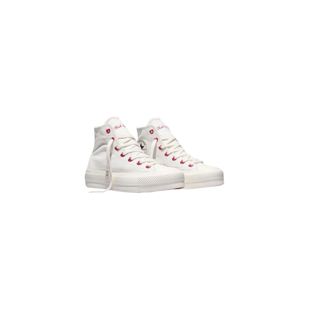 White sneakers with red laces