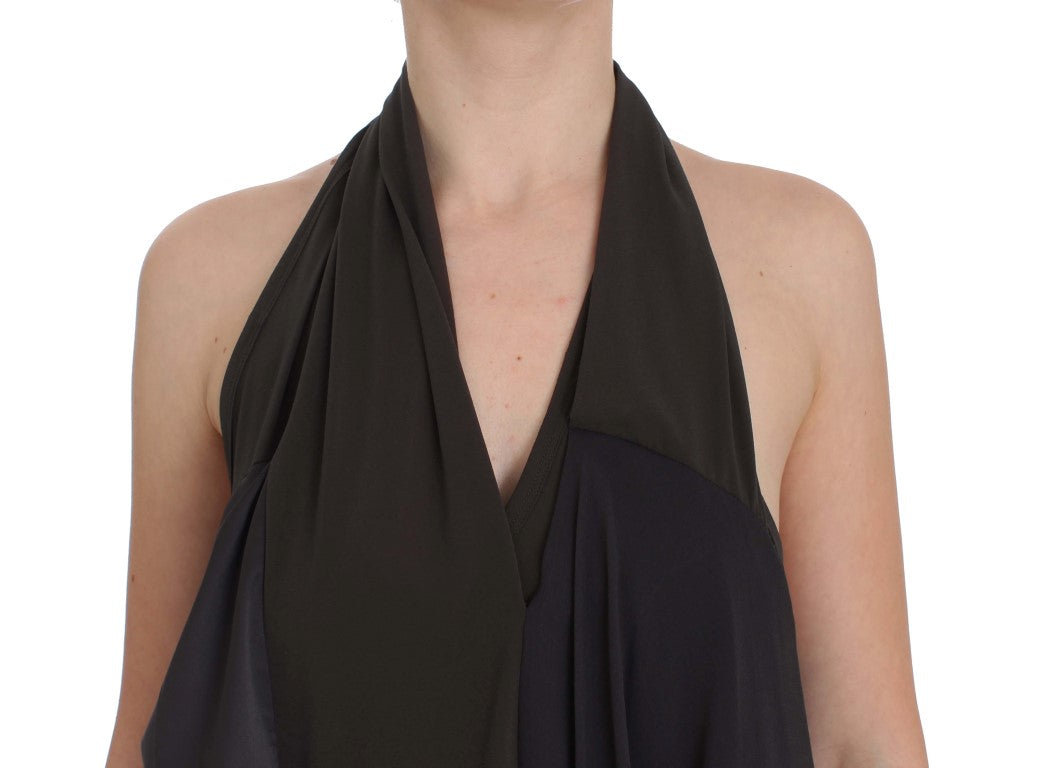 Black off-the-shoulder top on a woman's torso