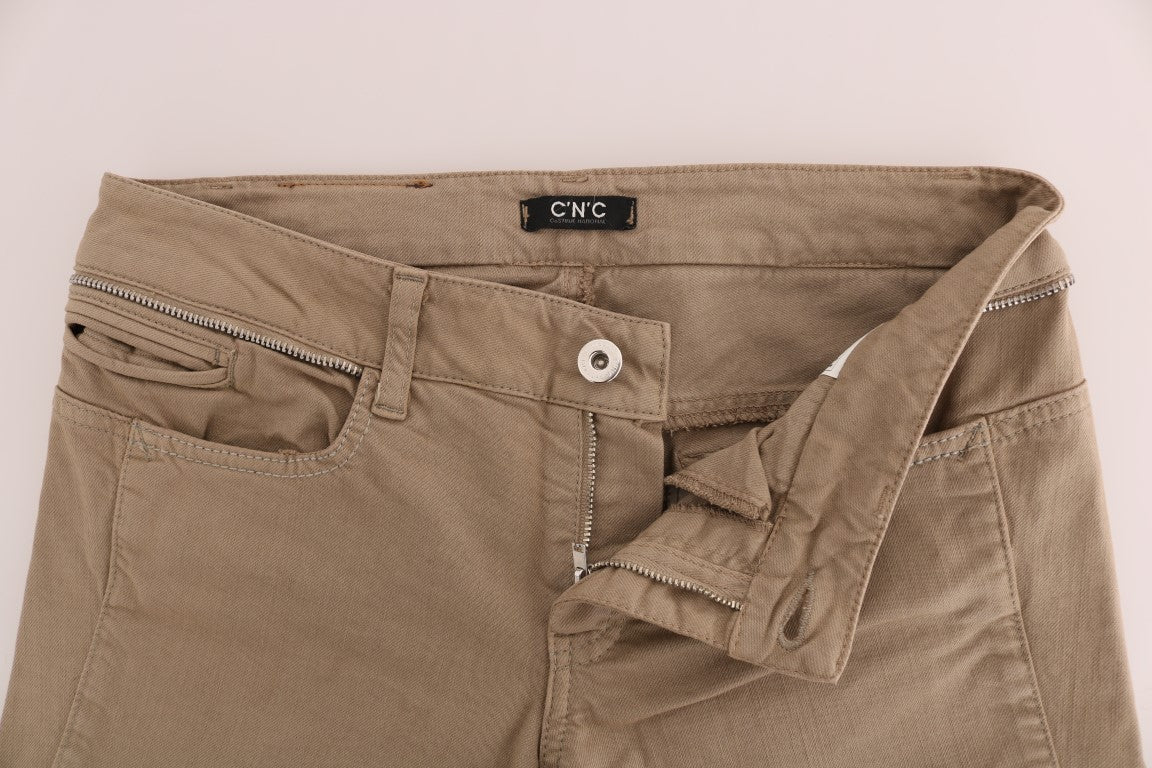 Pair of light brown jeans with zippered pockets