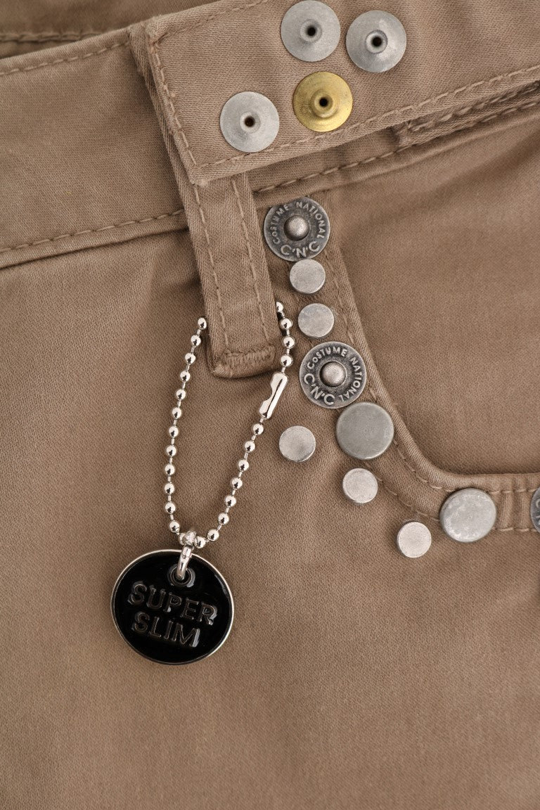 Silver charms on a chain attached to a black tag