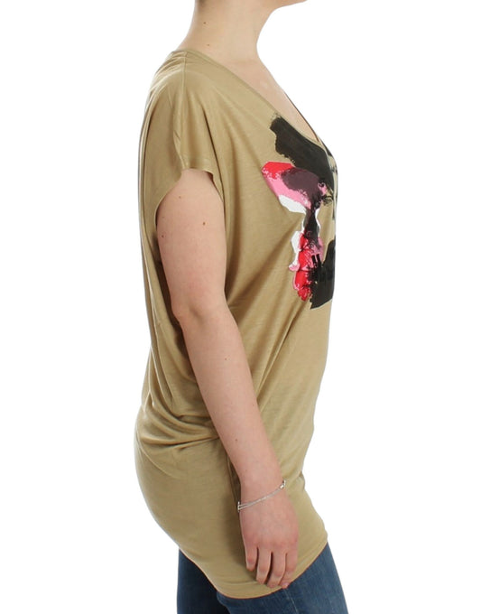 Tan maternity top with floral print on front
