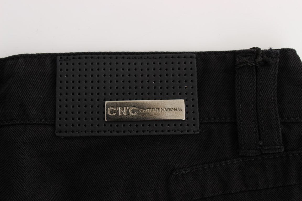Black belt with gold buckle and label
