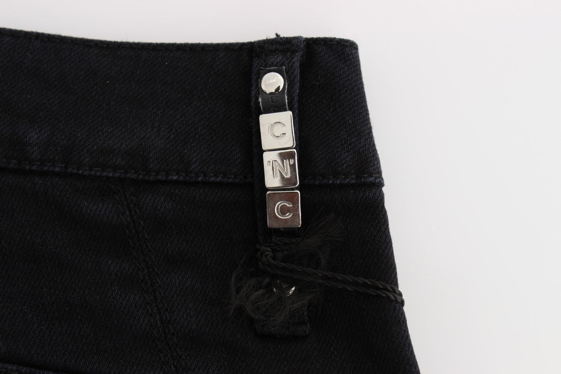 Pair of jeans with metal button closure