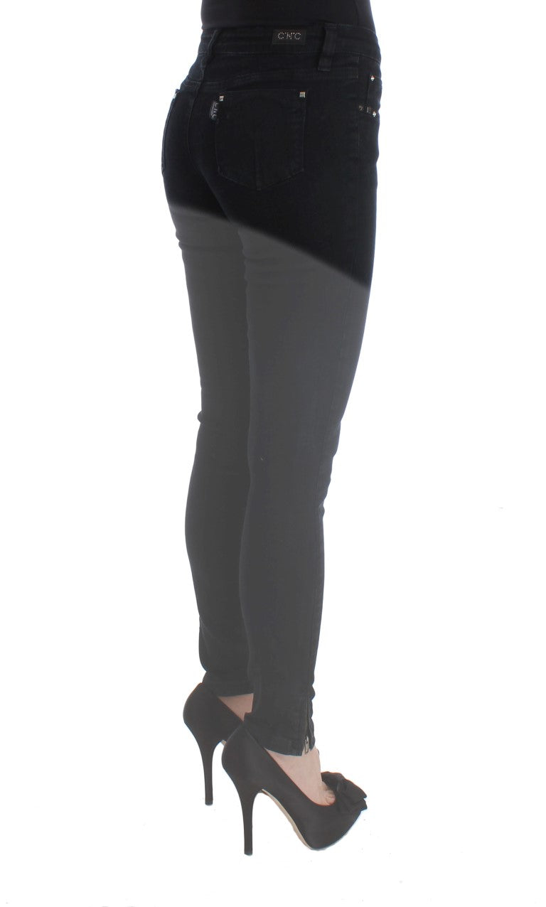 Woman wearing black pants and heels
