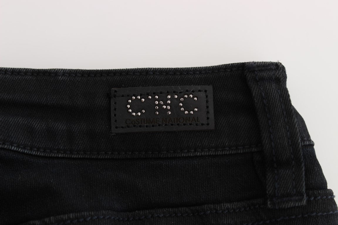 Black denim jeans with a label on the waistband