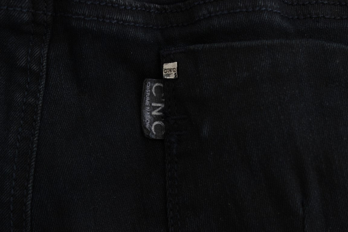 Pair of blue jeans with a small white tag on the waistband