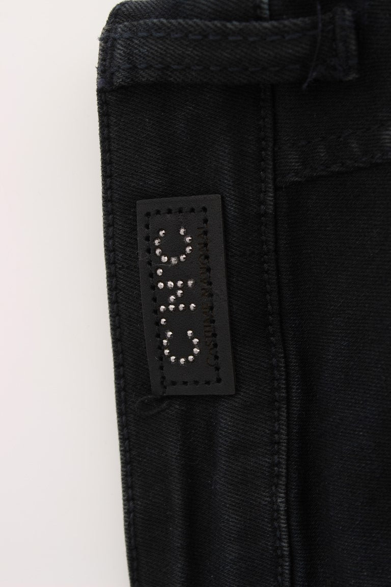 Black denim jeans with a label on the waistband