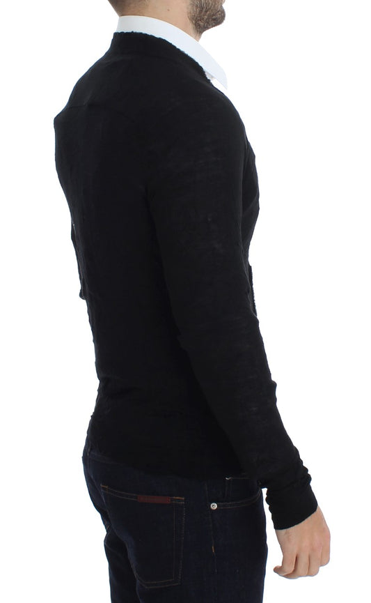 Man wearing black sweater and blue jeans