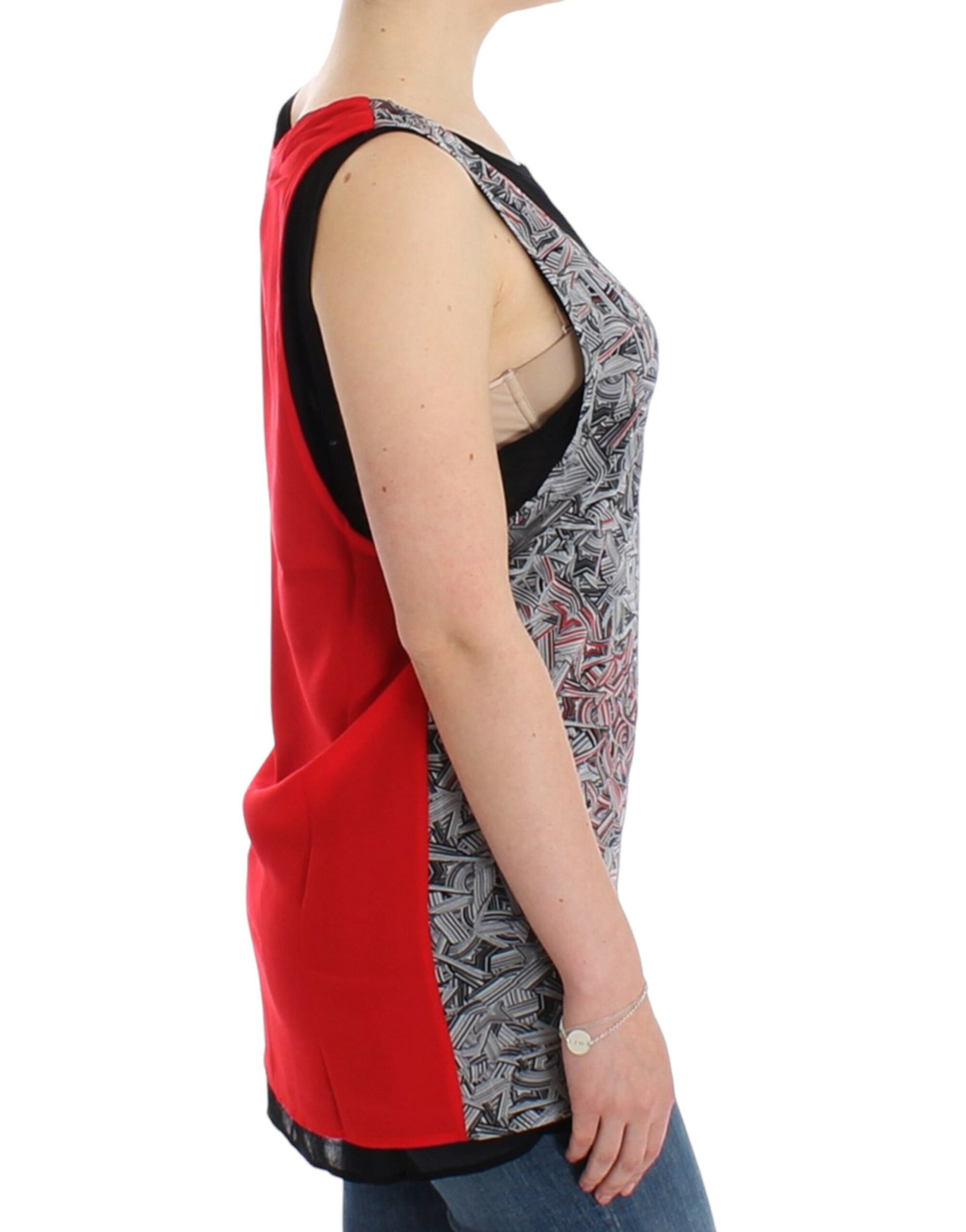 Woman wearing a red and black vest