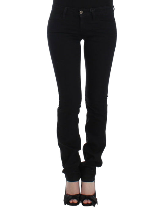 Pair of black skinny jeans with a high waist and zipper detailing