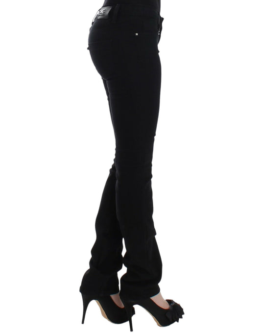 Woman wearing black pants and heels