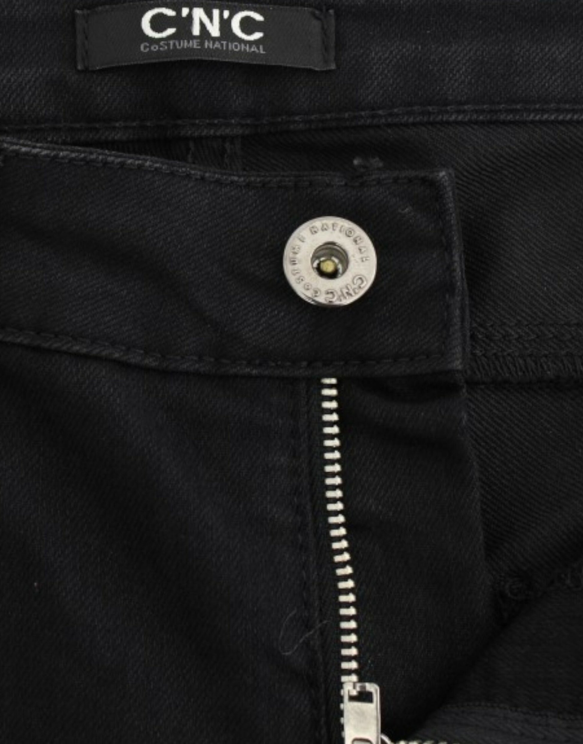 Pair of blue jeans with a button and zipper on the front