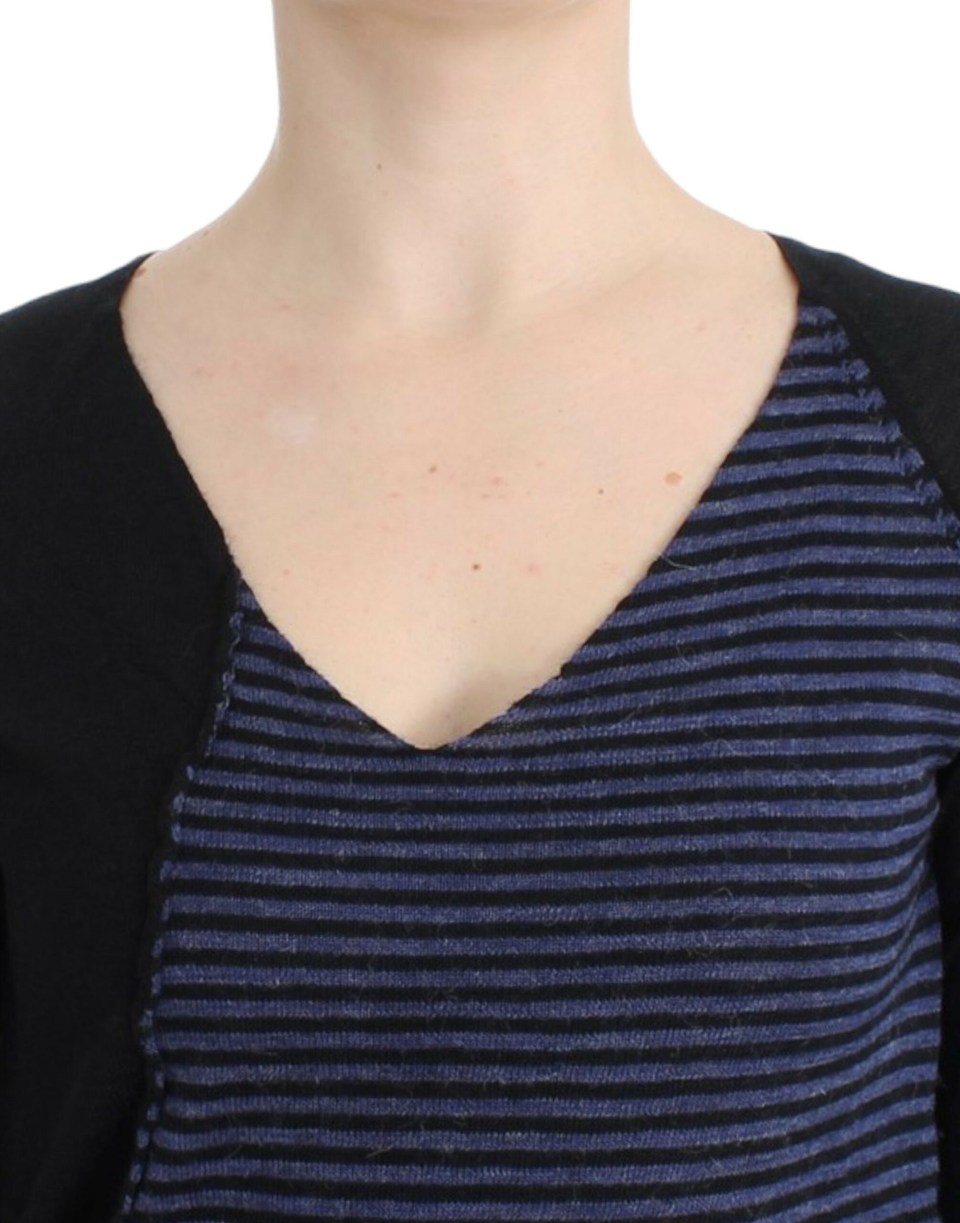 Woman wearing a black and blue striped top