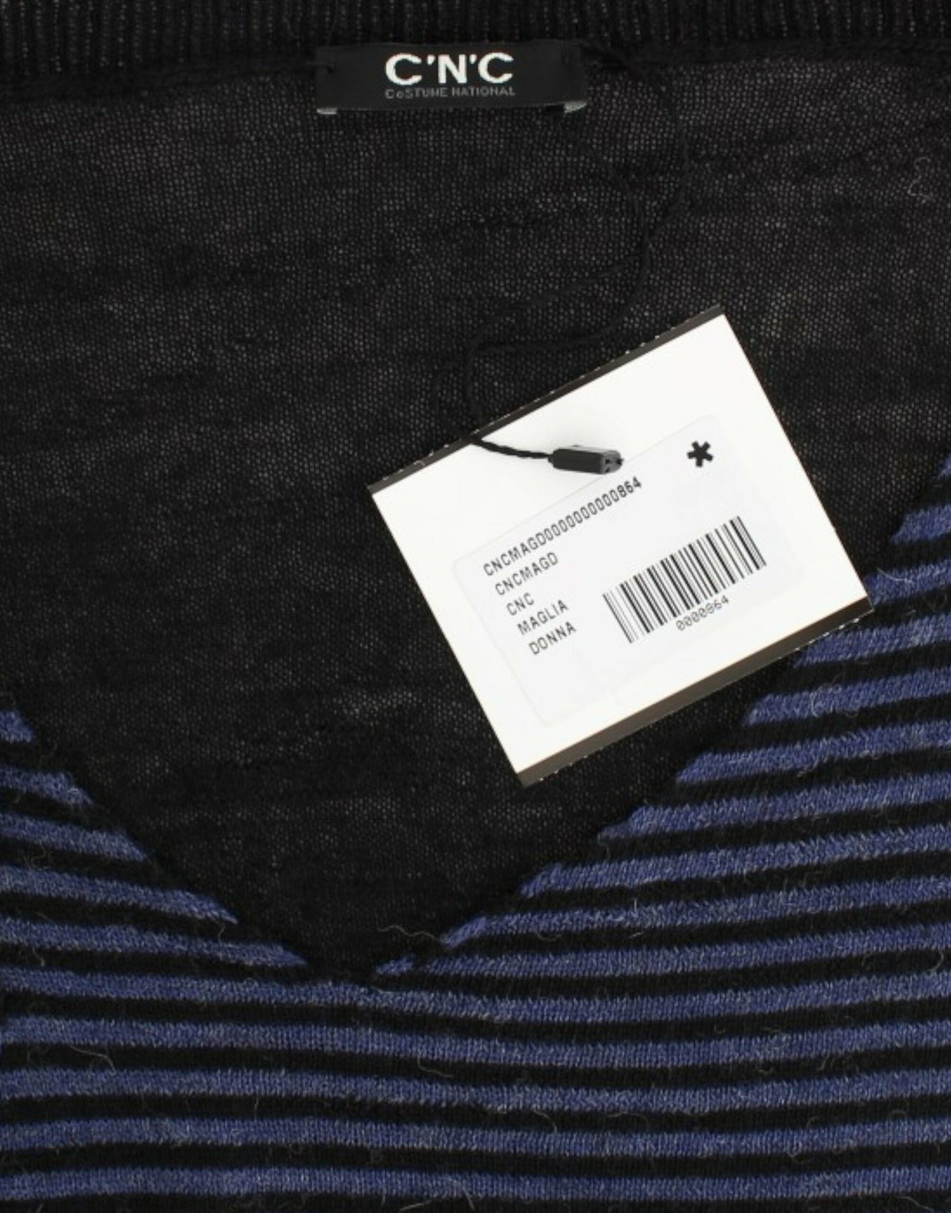 Blue sweater with tag on neck
