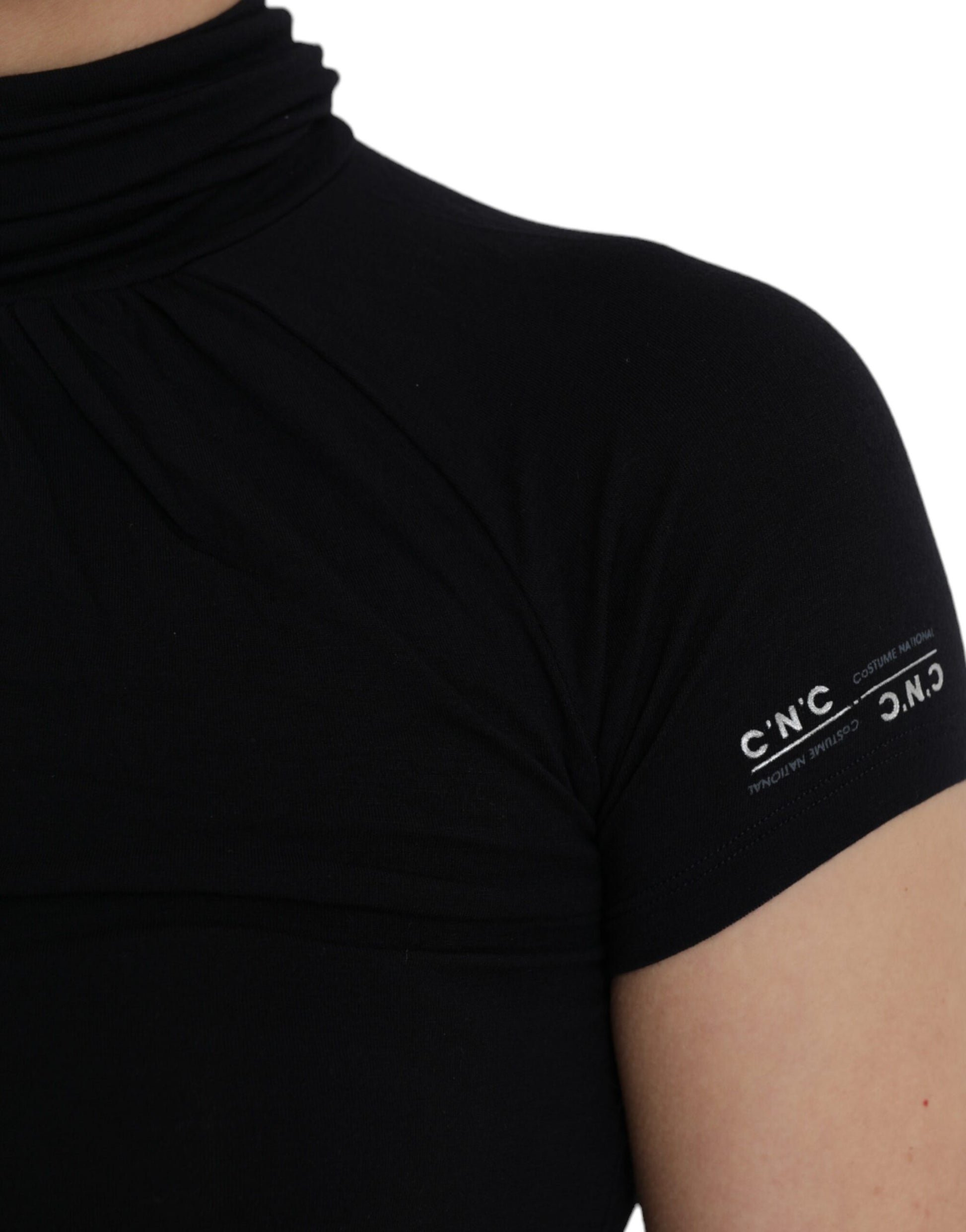 Black sleeveless top with a high neckline