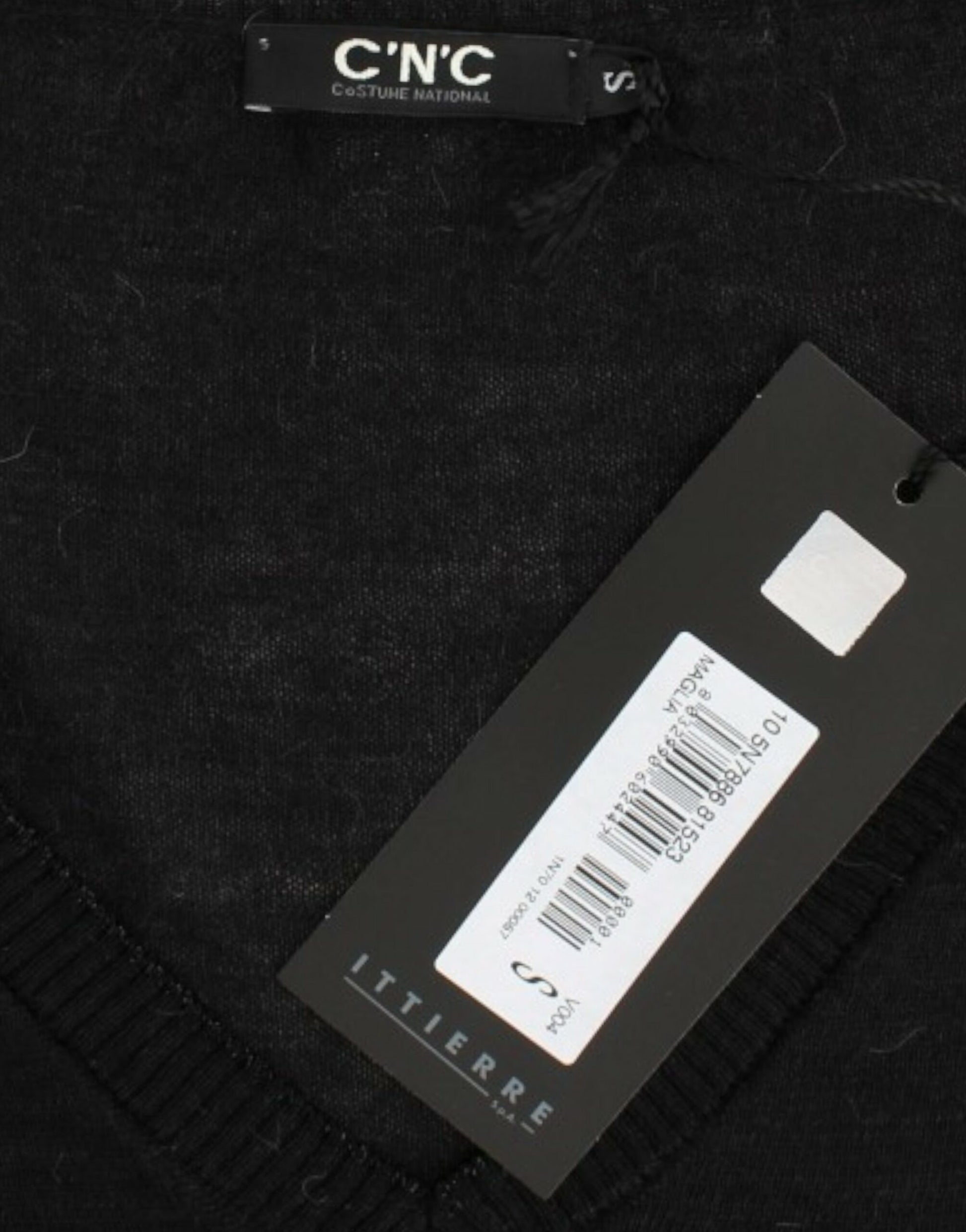 Black sweater with tag on neck