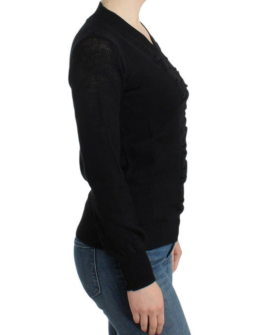 Woman wearing black sweater and blue jeans