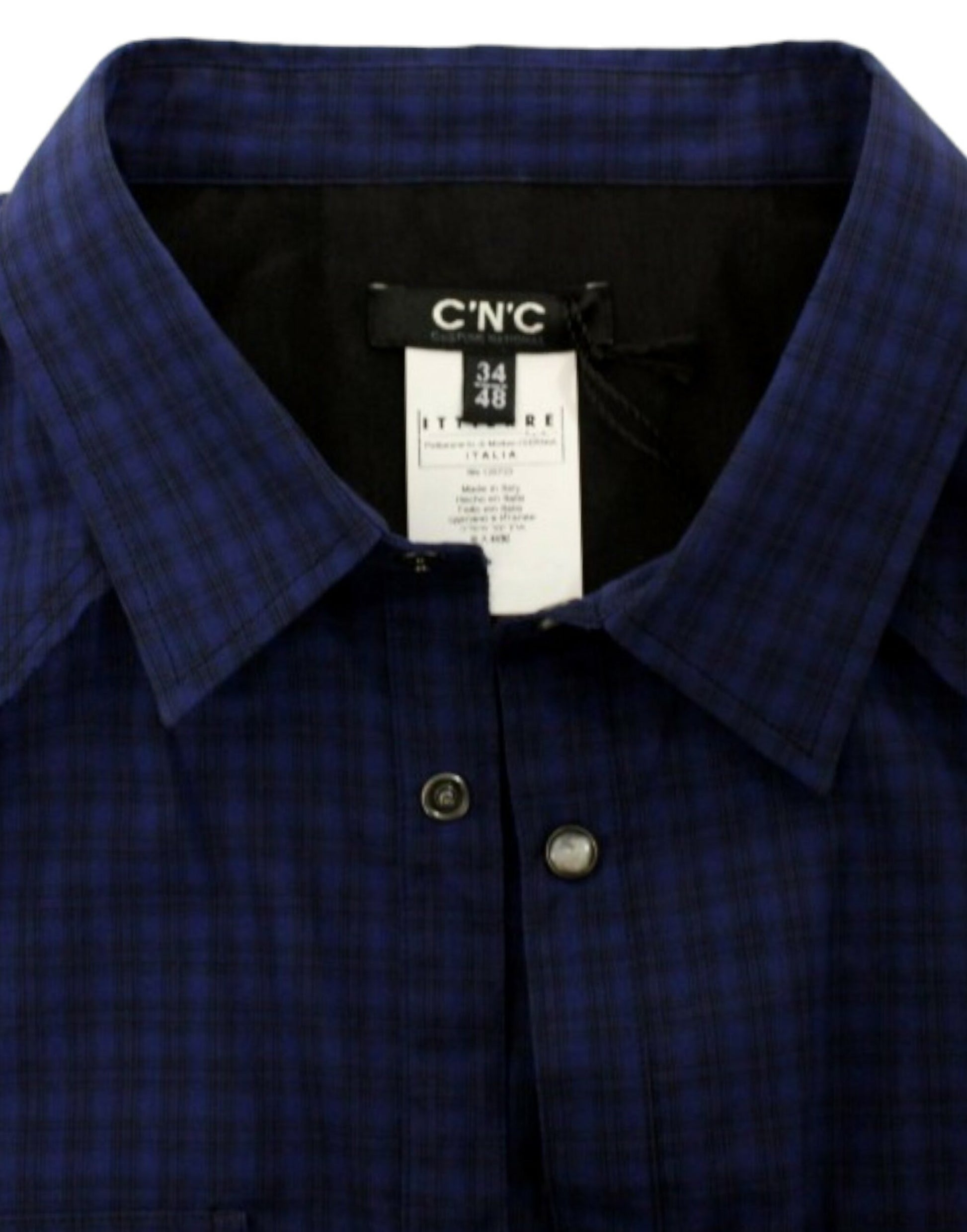 Blue plaid shirt on hanger