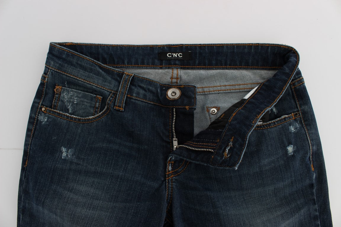 Pair of blue denim jeans with button closure