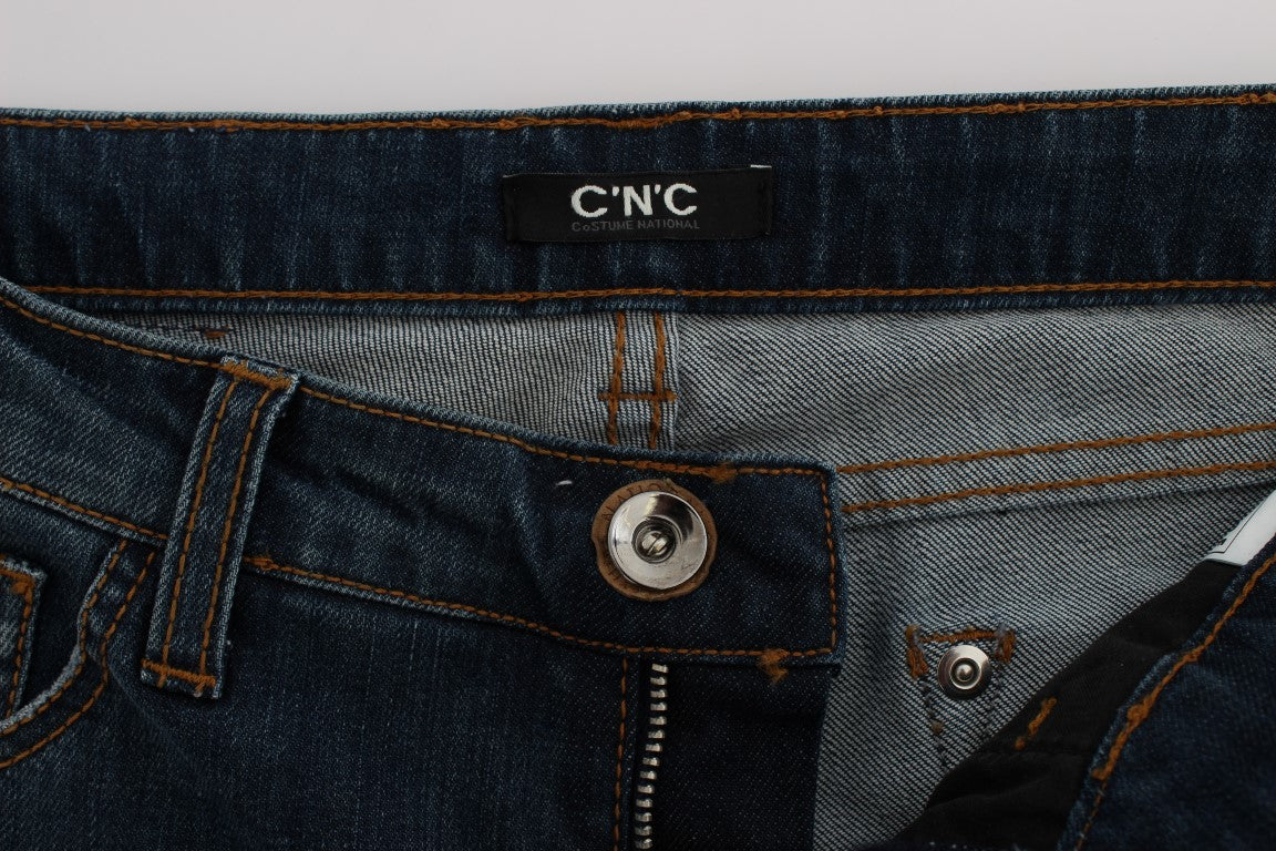 Blue denim jeans with button closure