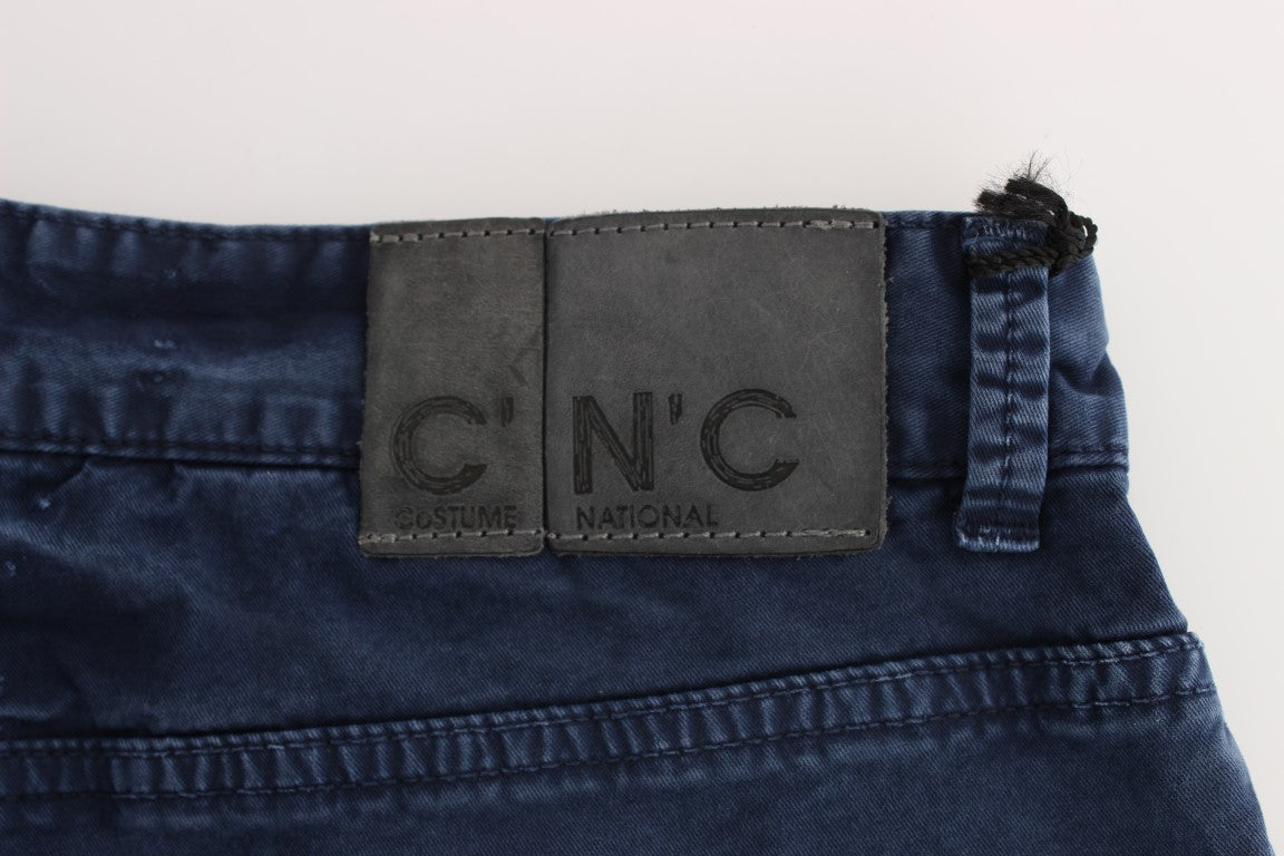 Blue jeans with a black label on the waistband