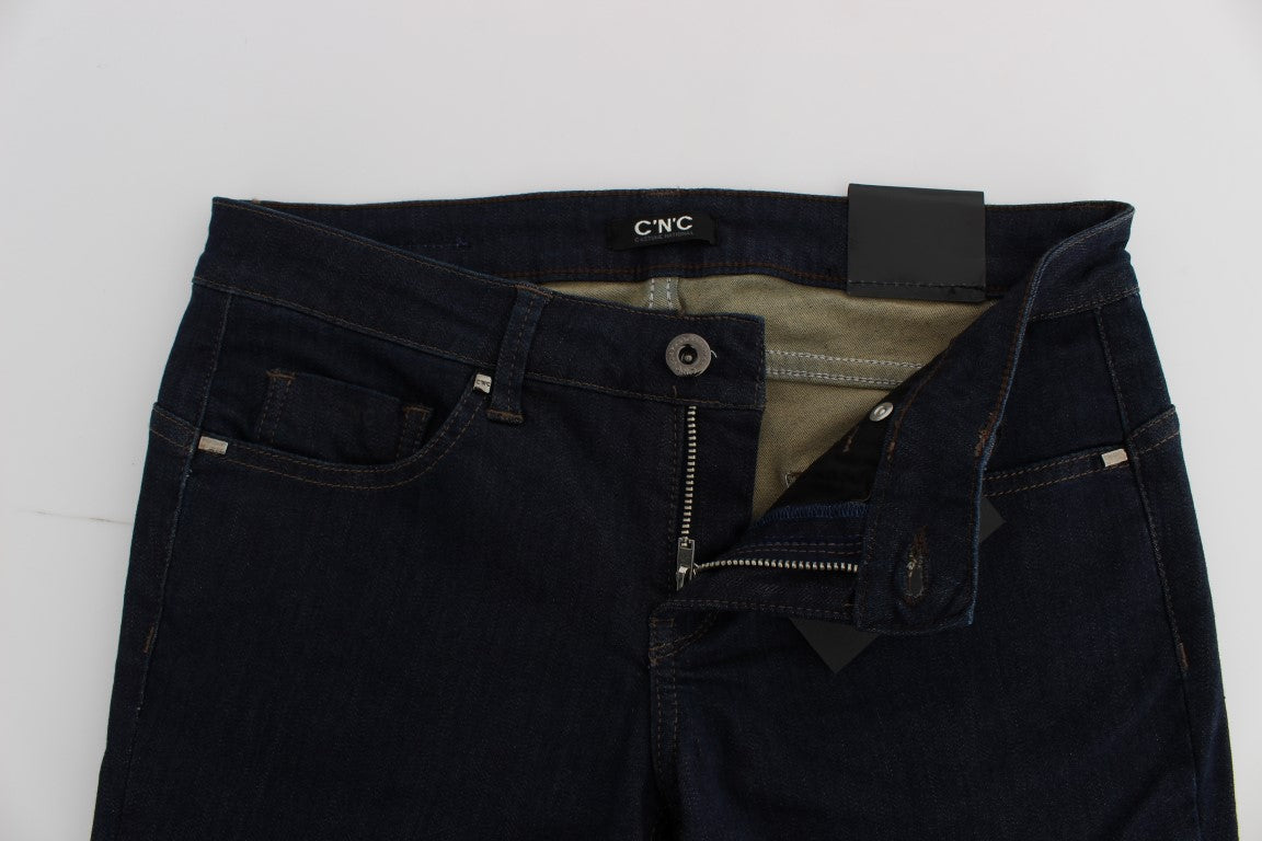 Pair of blue jeans with zippered front pockets