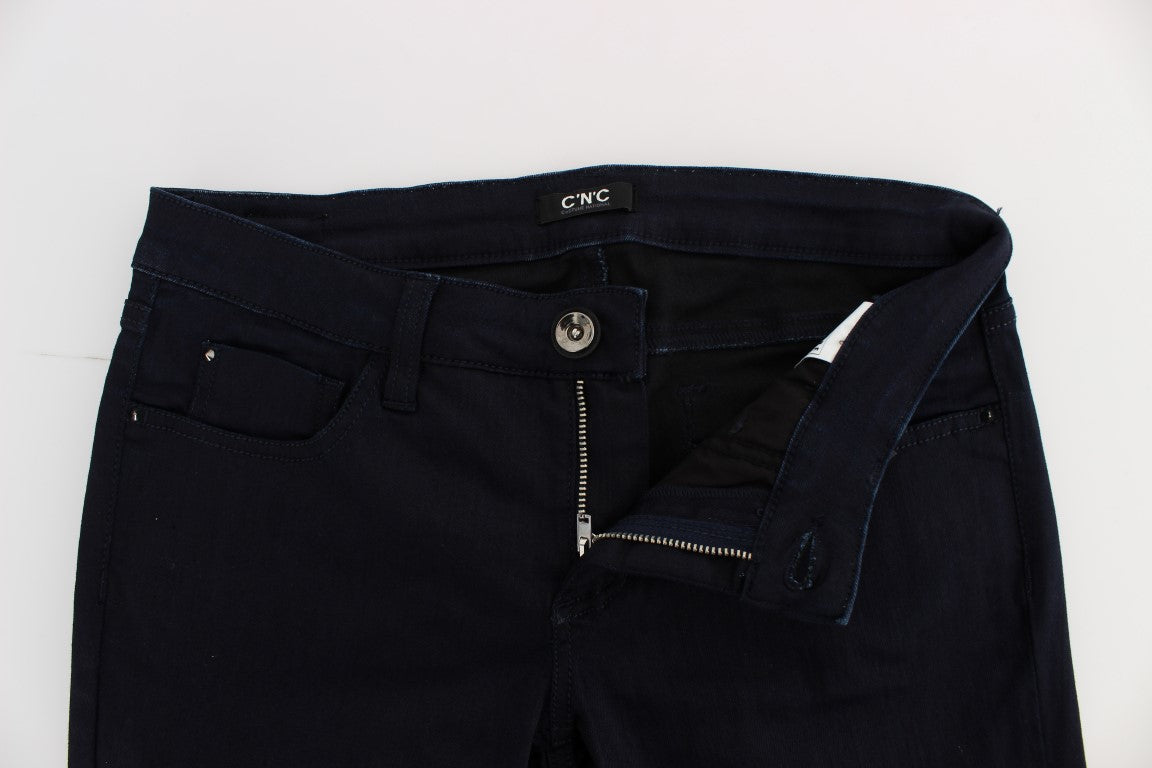 Dark blue denim jeans with zipper detailing on front
