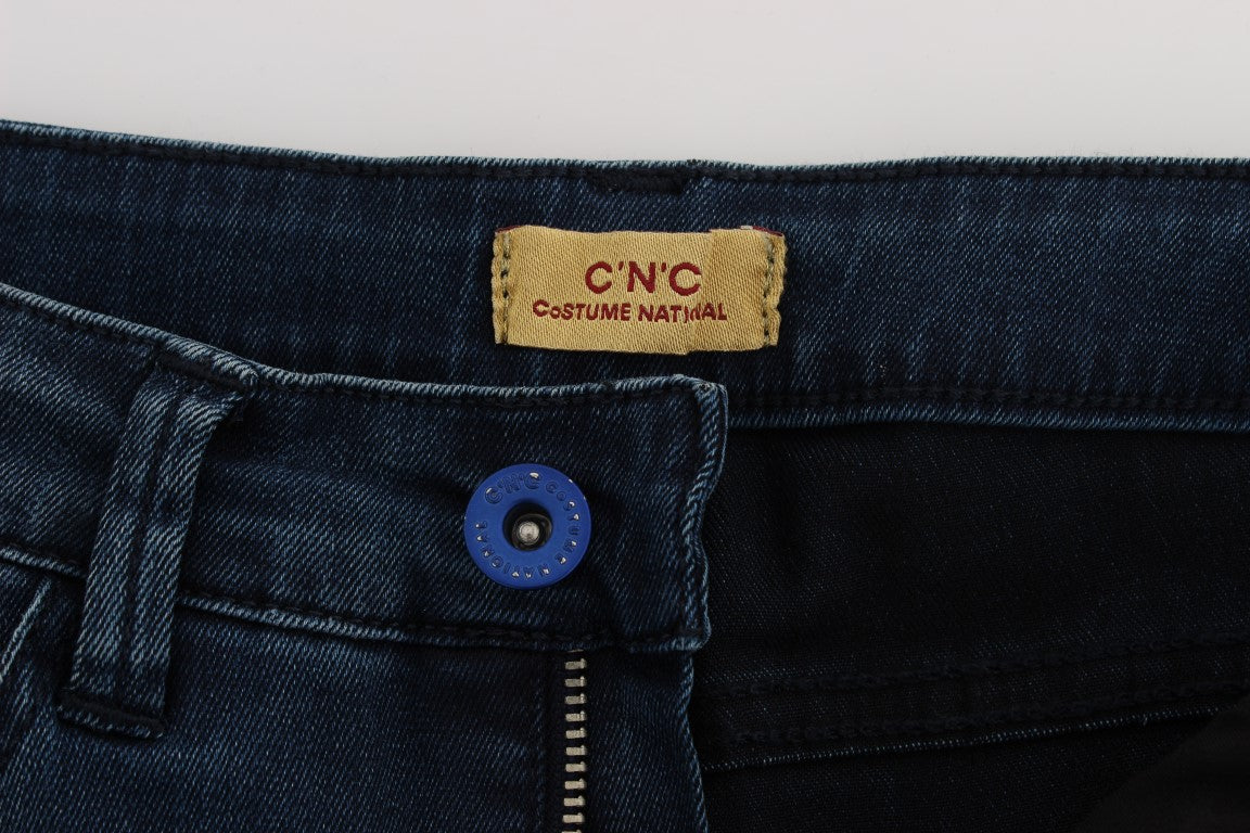 Blue denim jeans with a label on the waistband