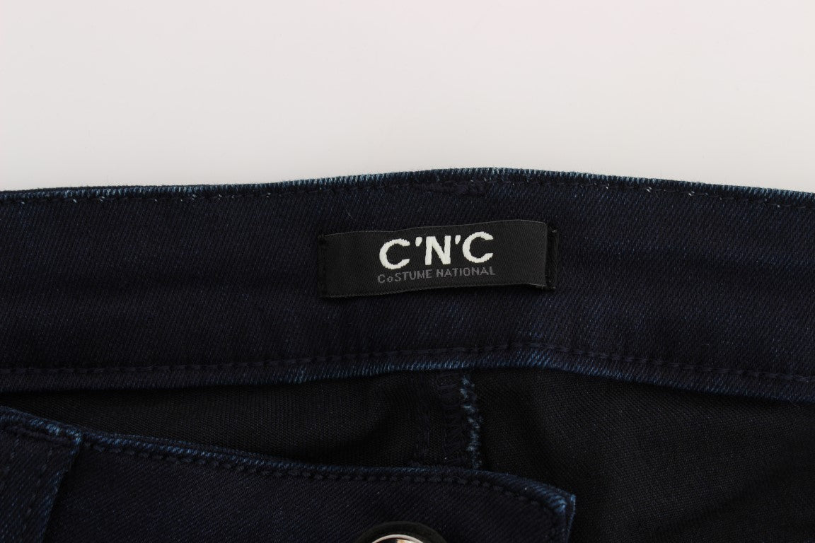Dark blue denim jeans with a label on the waistband