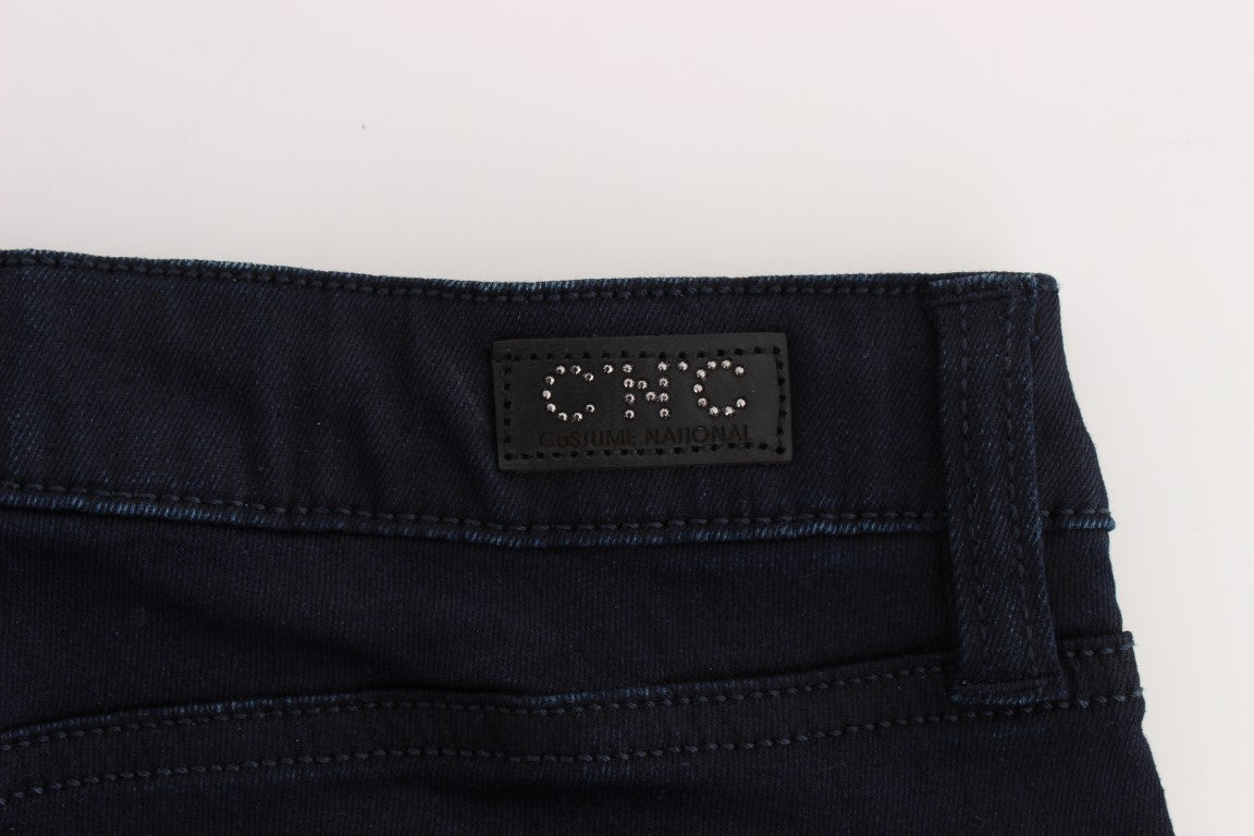Pair of dark blue jeans with a label on the waistband