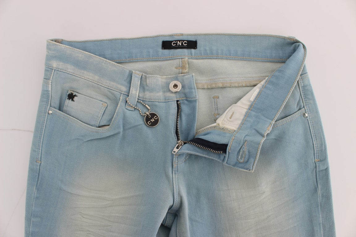Light blue denim jeans with zipper on front