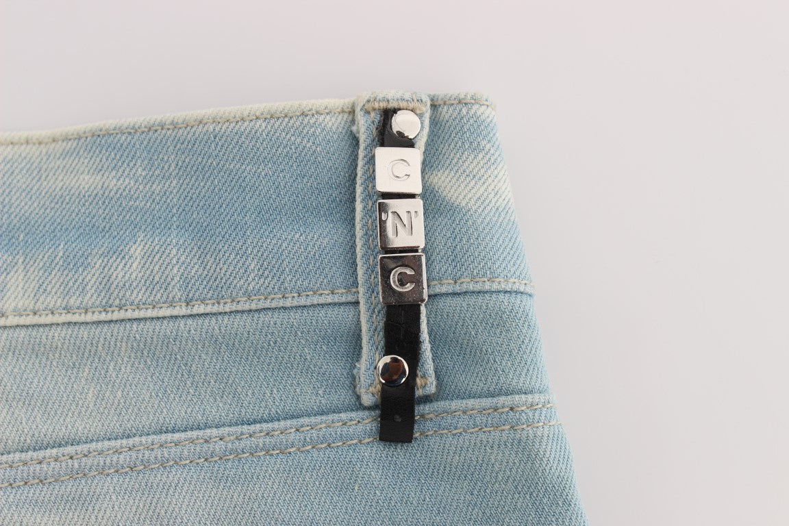 Blue denim jeans with silver button closure