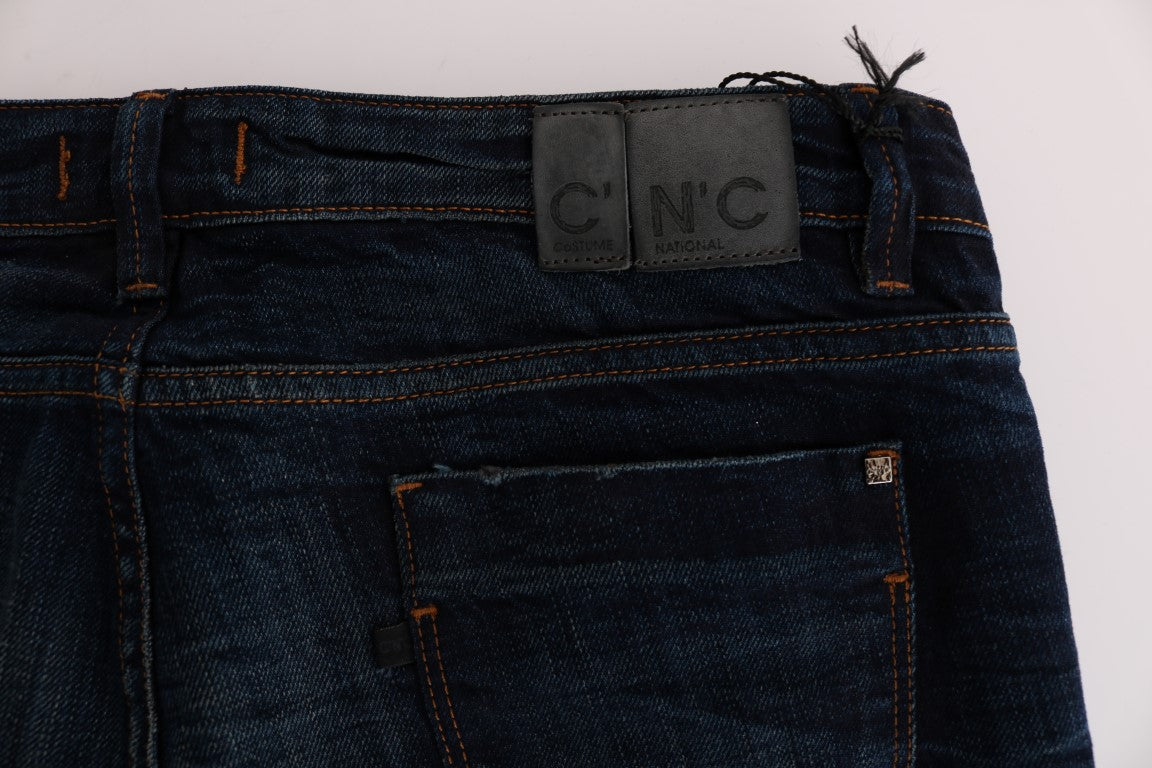 Pair of blue jeans with a black label on the waistband