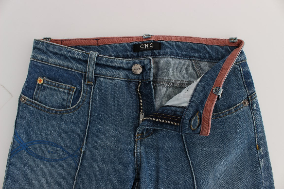 Blue denim jeans with red stitching on waistband
