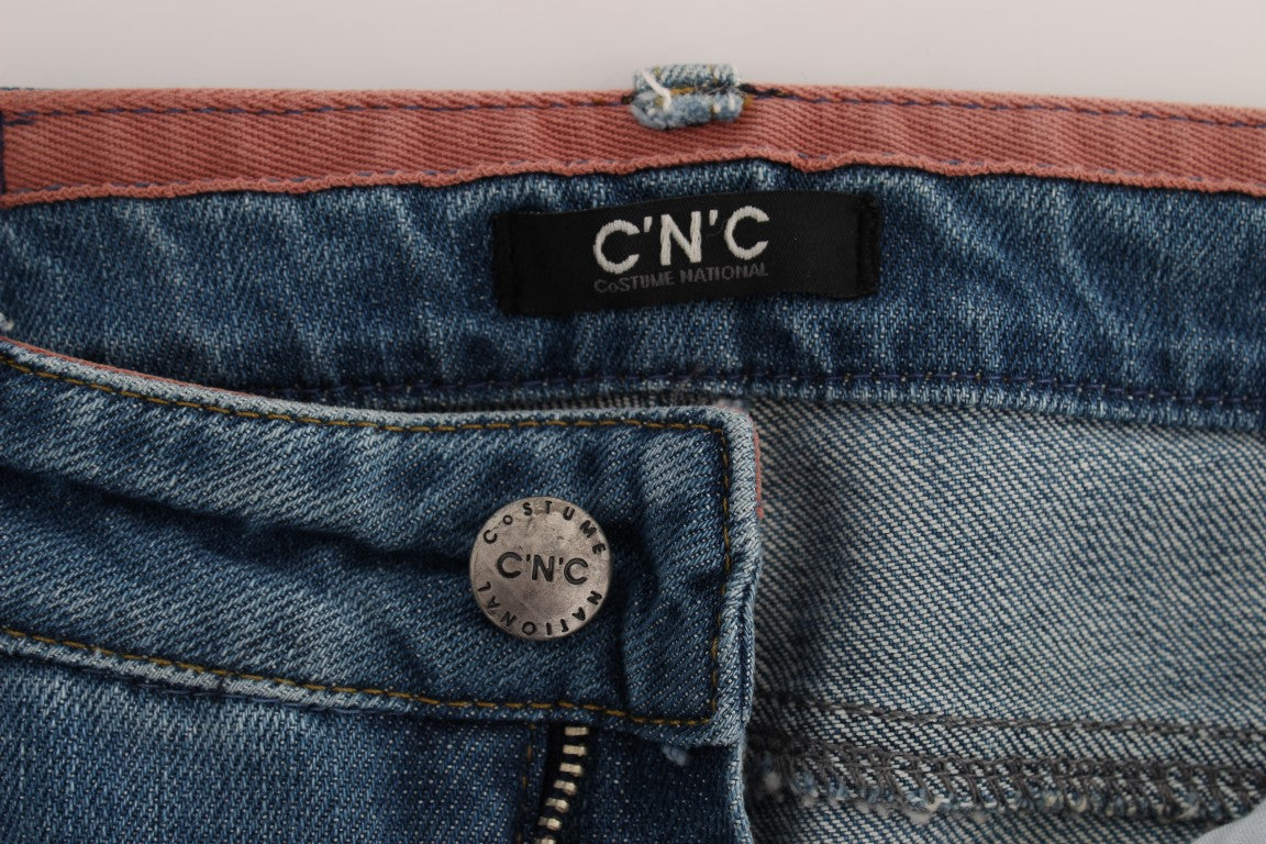 Blue denim jeans with red stitching on waistband