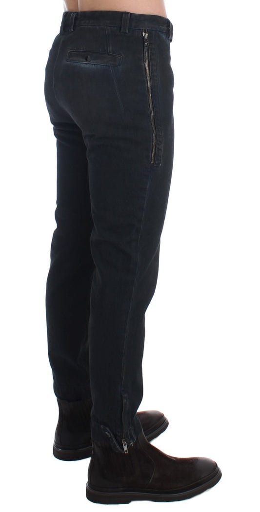 Pair of dark blue jeans with zipper detailing on legs and back pockets