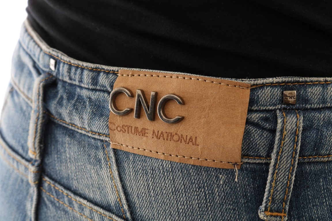 Brown leather belt loop on blue jeans
