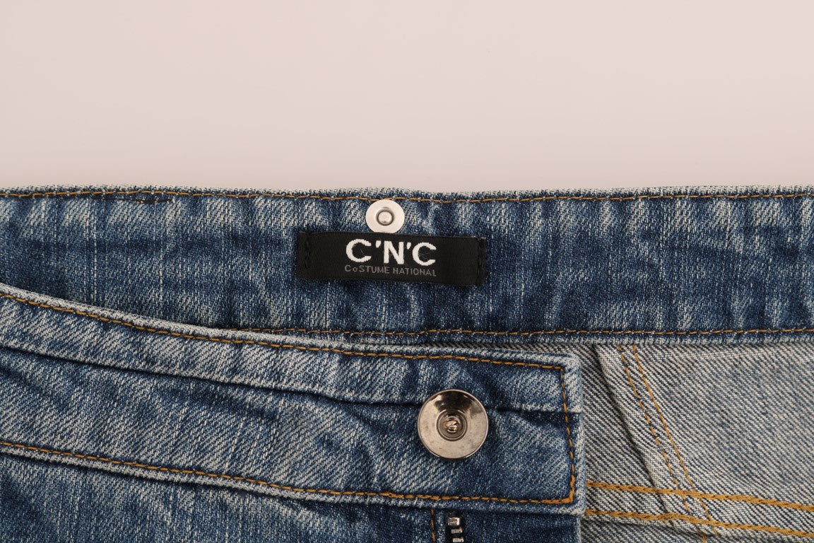 Blue denim jeans with button closure