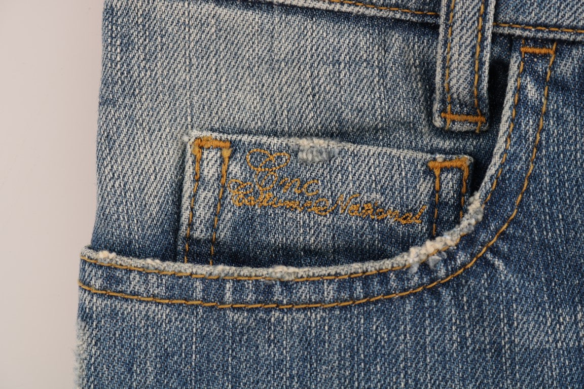 Blue denim jeans with yellow stitching on pocket