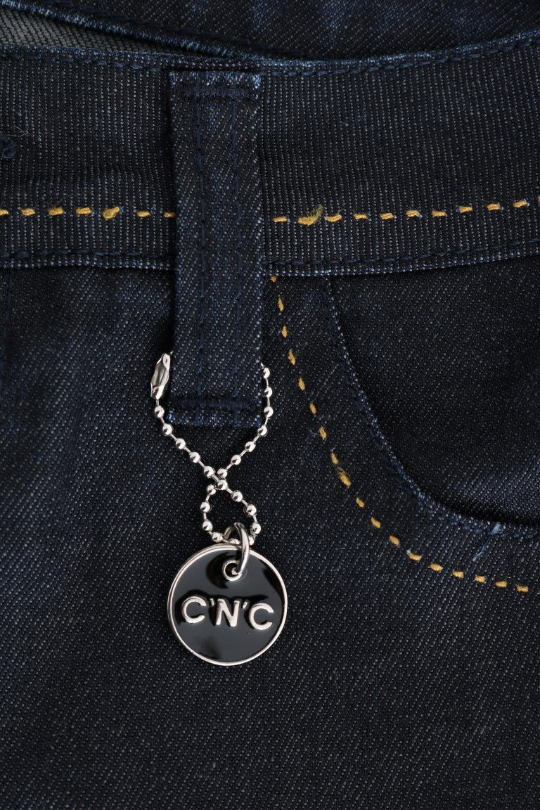 Silver charm on jeans