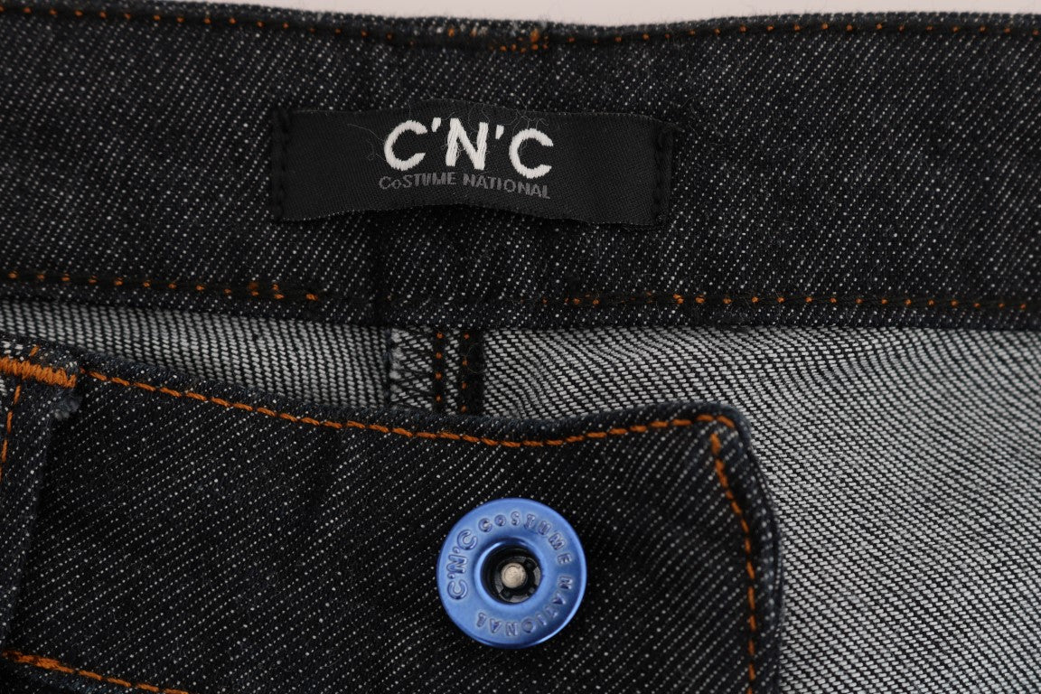 Pair of jeans with a blue button