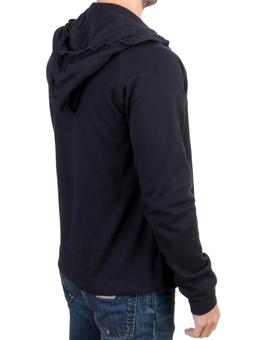 Black hoodie on man's back
