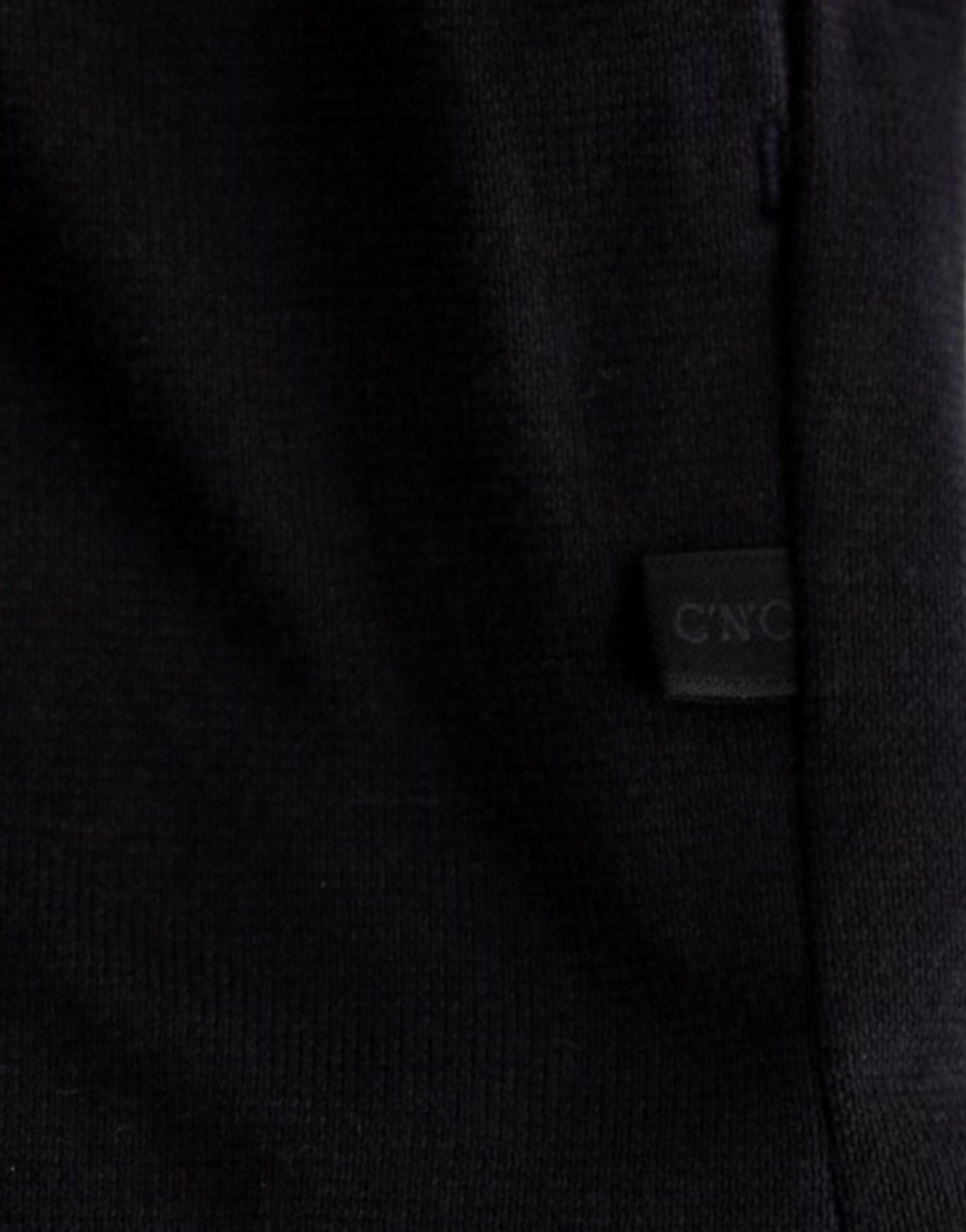 Black fabric with a label on it