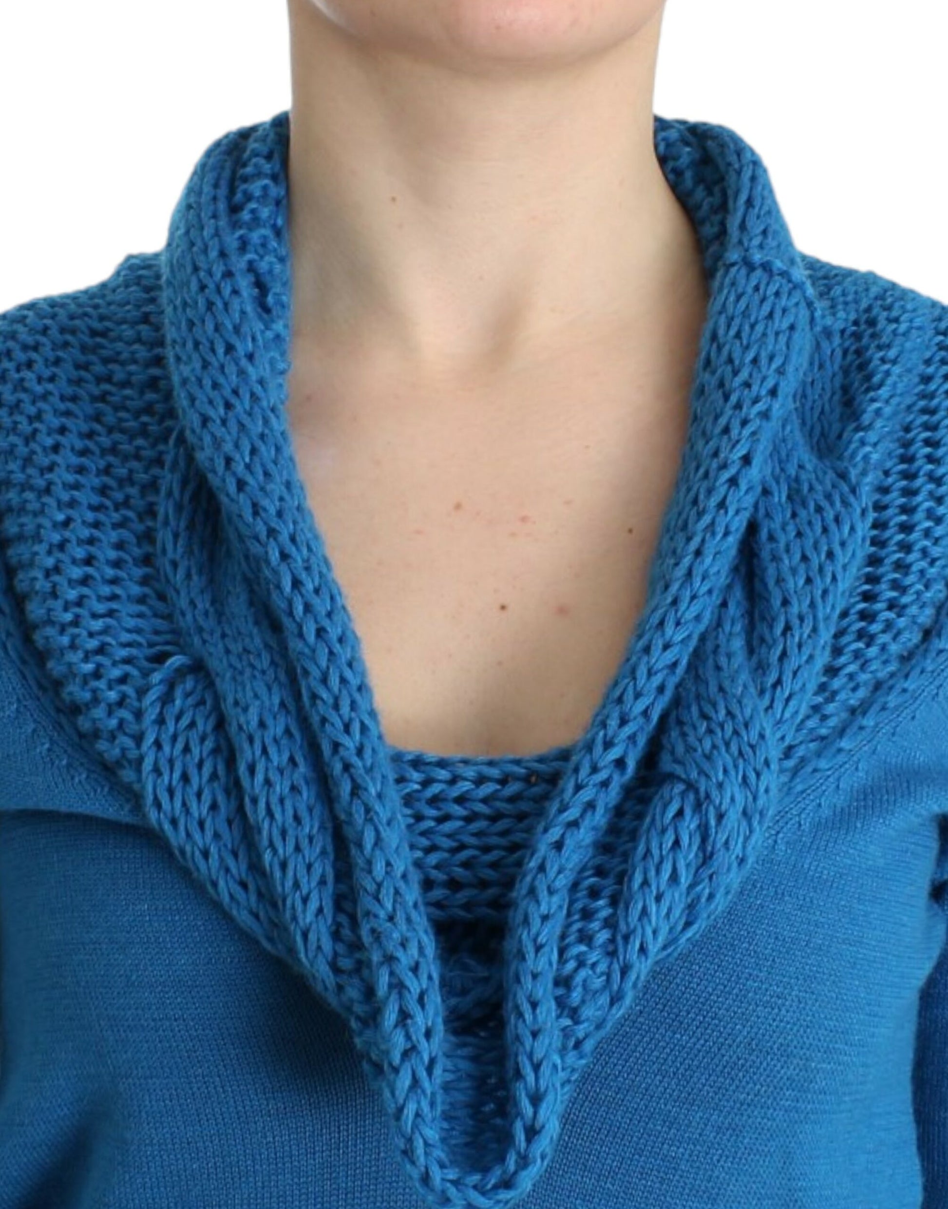 Blue crocheted scarf worn by woman