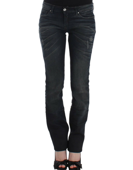 Pair of women's jeans with distressed design and zipper detailing