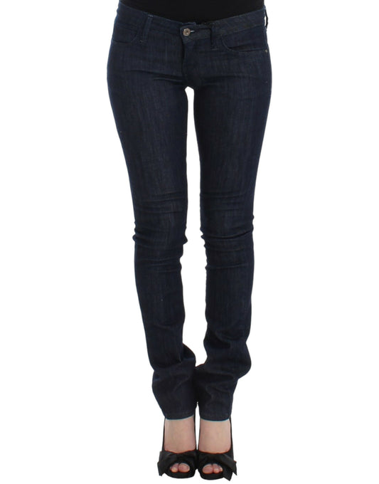 Woman wearing dark blue jeans and black heels