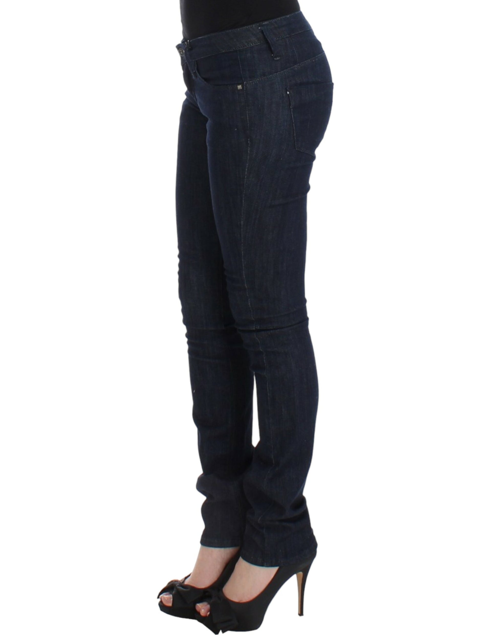 Woman wearing blue jeans and black heels