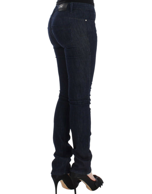 Woman wearing blue jeans and black high heels