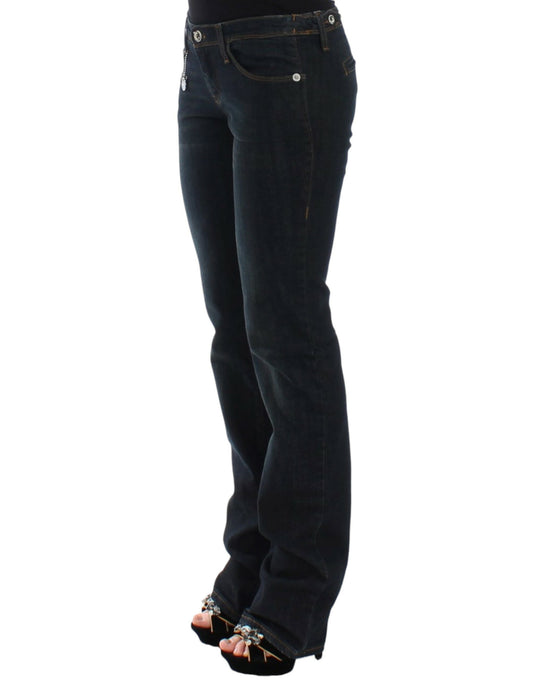 Woman wearing blue jeans and black high heels