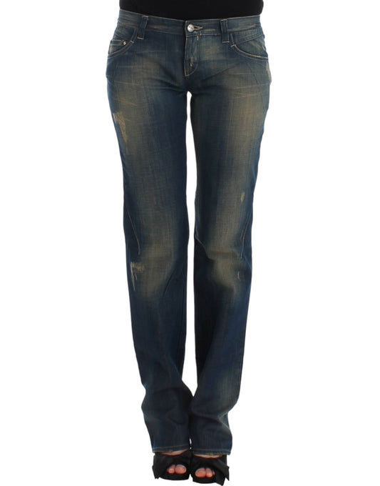 Pair of women's jeans with faded wash and distressed areas on thighs
